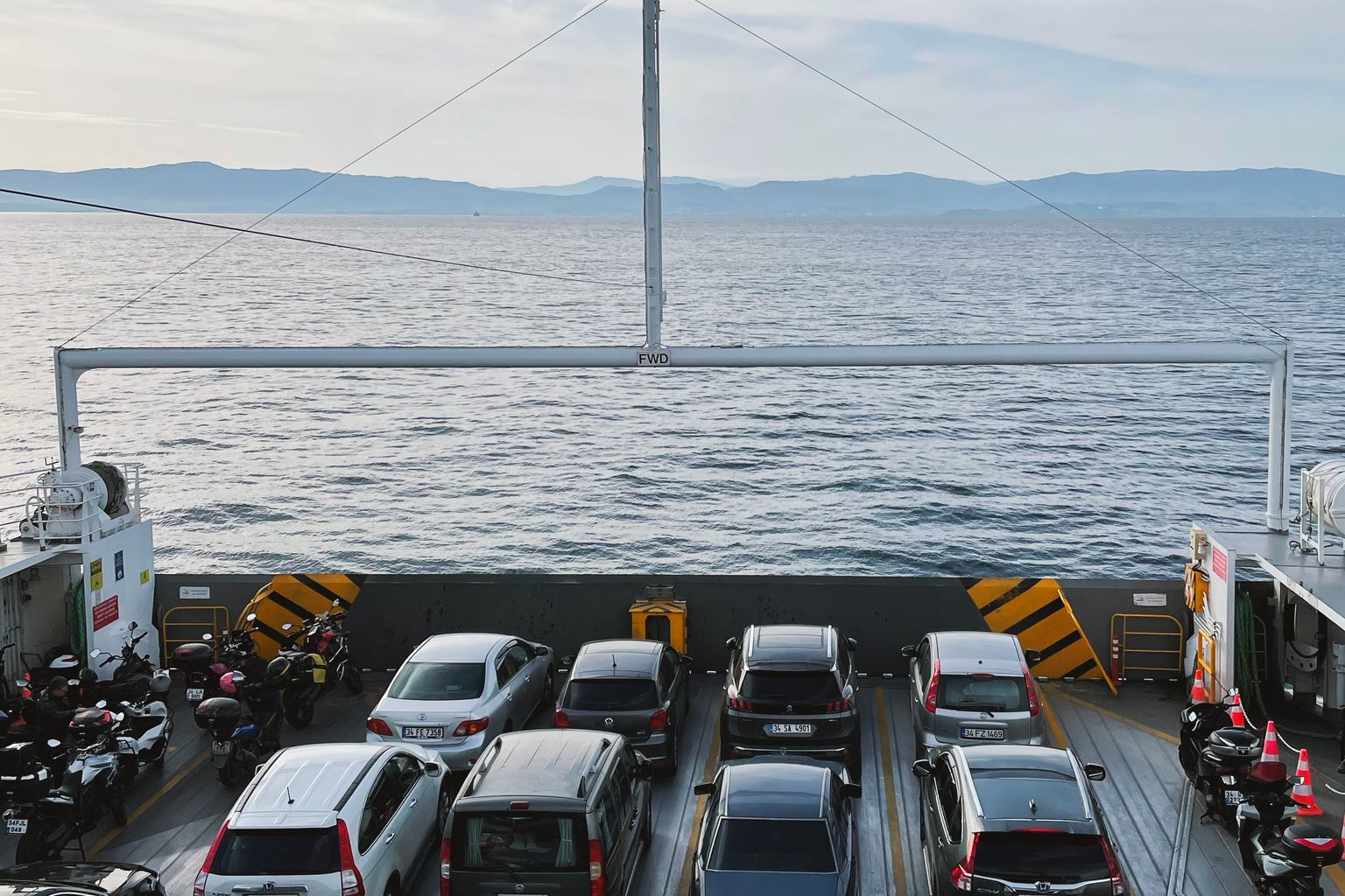Cars parked on a car ferry deck, showing why Steamship Authority reservations matter